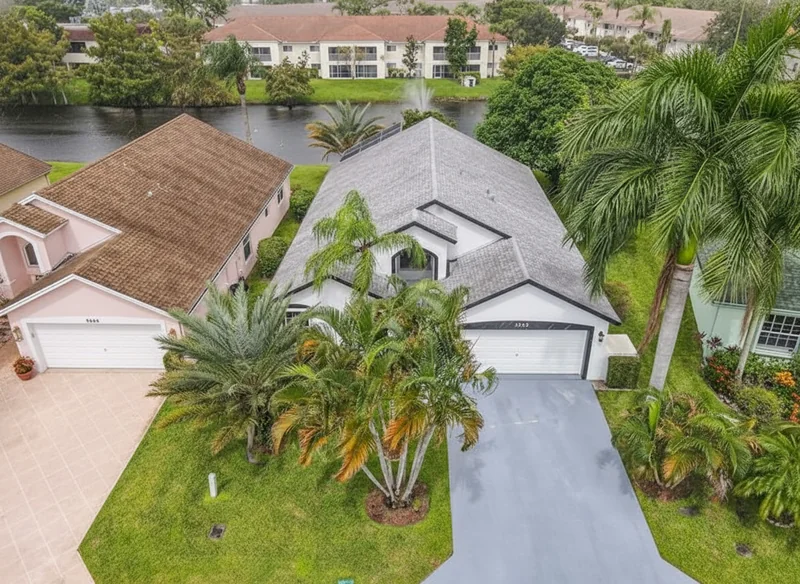 Remove the car on the drive way on the left, and improve the overall image quality