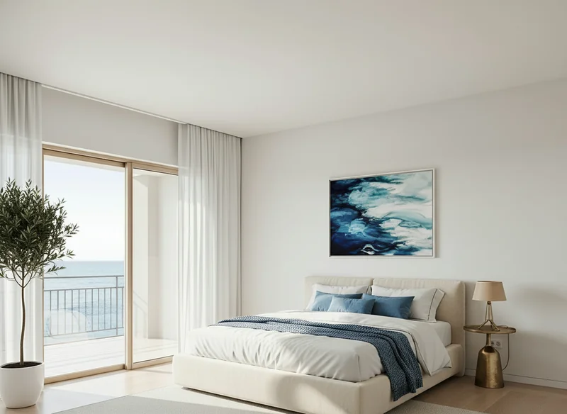 Furnish the serene bedroom with a low-profile cream platform bed centered on a large textured beige rug. Dress the bed in ...